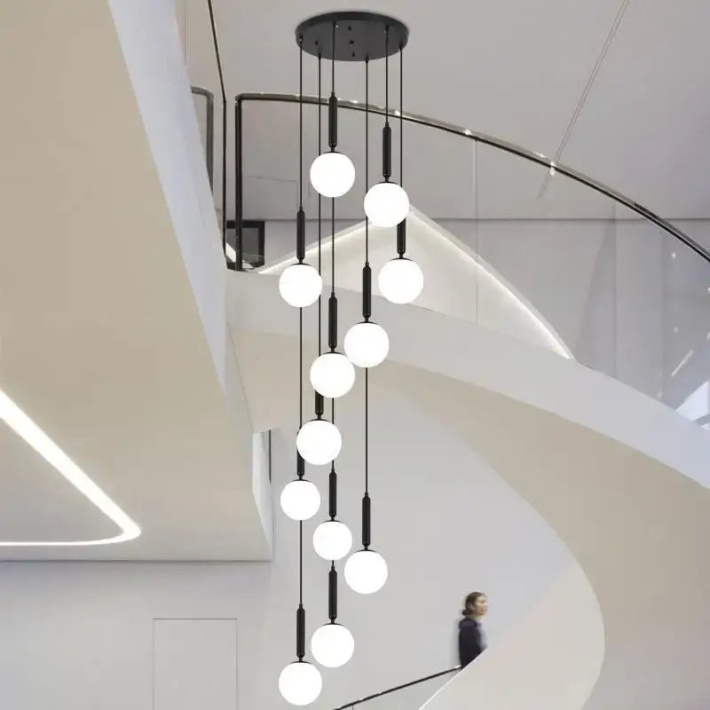 Modern black DecorBites LED glass ball chandelier with multiple white spherical LED glass balls for stylish indoor lighting