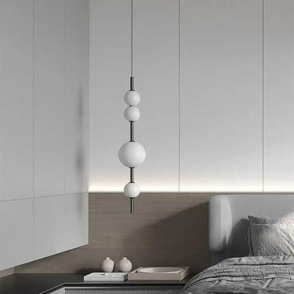 Minimalist decorbites led glass beads pendant chandelier with five matte white glass beads on black metal rod