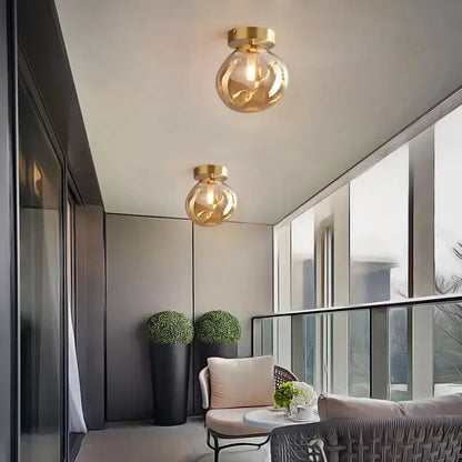 Decorbites led glass spherical ceiling chandelier with gold finish and warm amber glow for indoor lighting
