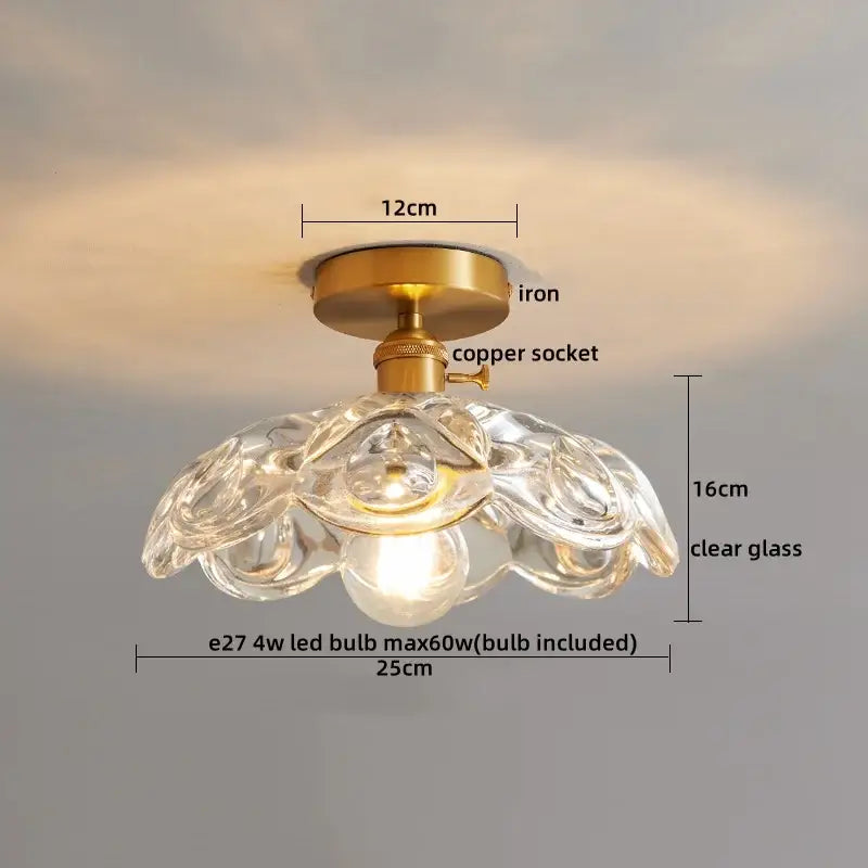 A clear glass flower-shaped decorbites led glass ceiling lamp with brass iron base and copper socket for interior decor