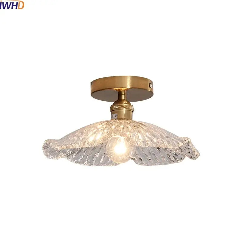DecorBites™ LED glass ceiling lamp with brass-finished metal base and ornate textured clear glass ceiling shade