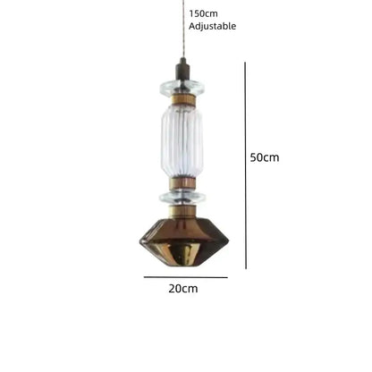 A modern decorbites led glass chandelier with clear amber ribbed cylinder and faceted bronze-colored base