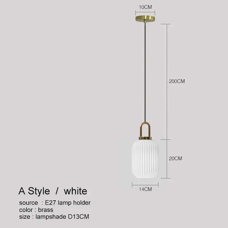 A modern white ribbed glass pendant lamp with brass fixture and chain in decorbites led glass chandelier design