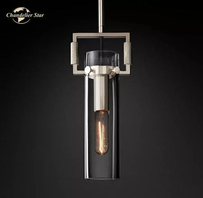 Modern industrial pendant lights with brushed nickel frame and clear glass cylinder by DecorBites LED glass for kitchens