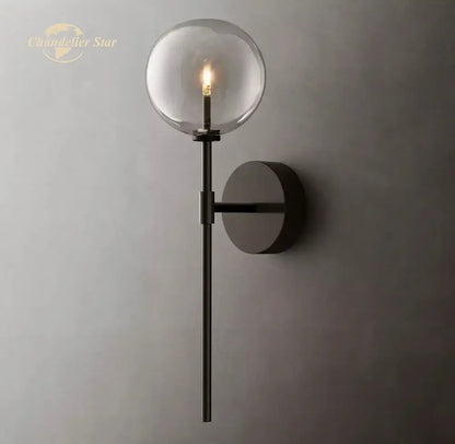 Modern black metal wall sconce with glass globe and exposed filament bulb for indoor decorbites led glass lighting
