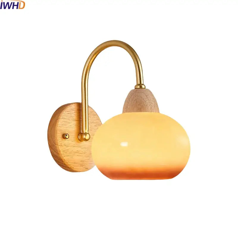 Decorbites™ modern nordic wall light fixture with warm amber glass globe brass arch and wooden base for bedside use