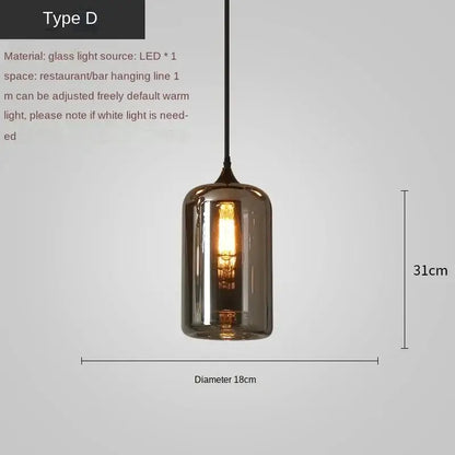 A sleek dark smoked glass decorbites led glass pendant chandelier with warm led bulb for kitchen dining bar décor