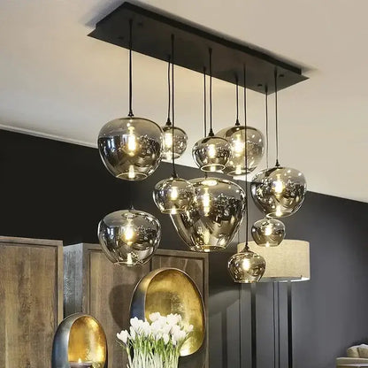 Modern DecorBites™ LED glass pendant chandelier with spherical glass shades and black ceiling mount for kitchen décor