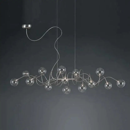 Modern silver-toned decorbites led glass pendant chandelier with clear glass spheres for living room or dining use
