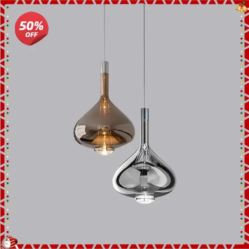 Two decorbites™ led glass pendant lamps with amber and clear teardrop glass shades for hotel kitchen restaurant lighting