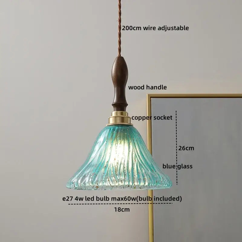Teal blue textured glass pendant light with wooden handle and copper socket from decorbites led glass pendant collection