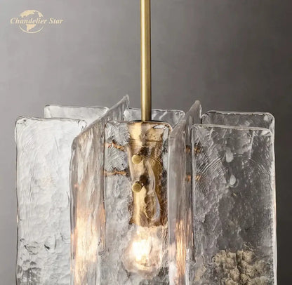 Decorbites led glass pendant light featuring clear textured glass panels and brass hardware for modern interiors