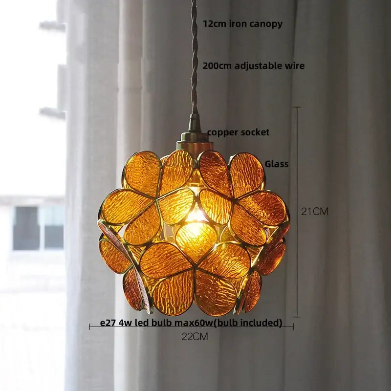 Amber-colored decorbites led glass pendant light with floral design and copper socket for modern kitchen decor