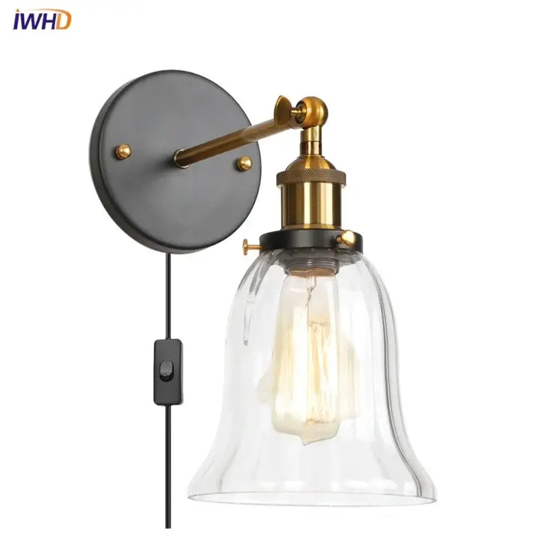 Brass-finished decorbites led glass wall lamp with clear bell-shaped shade and exposed Edison bulb for home decor