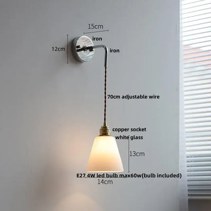 A sleek decorbites led glass wall light with a white glass shade, polished iron bracket, and adjustable copper socket wire