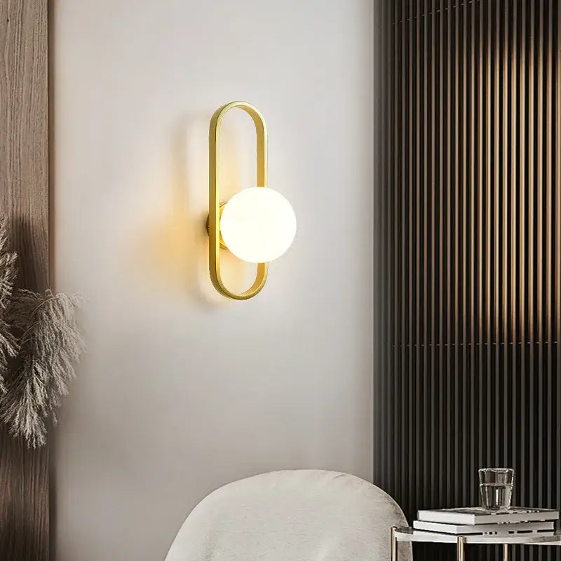 DecorBites gold-toned oval wall sconce lamp with frosted glass globe for bedroom living room staircase lighting