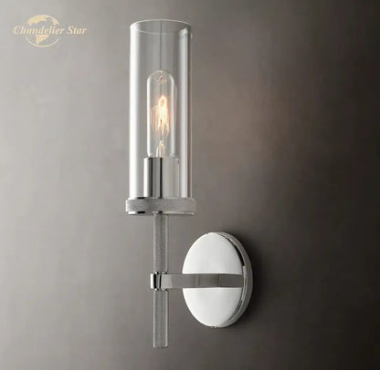 Chrome finished decorbites led glass wall sconce with clear glass cylinder and exposed filament bulb for indoor use