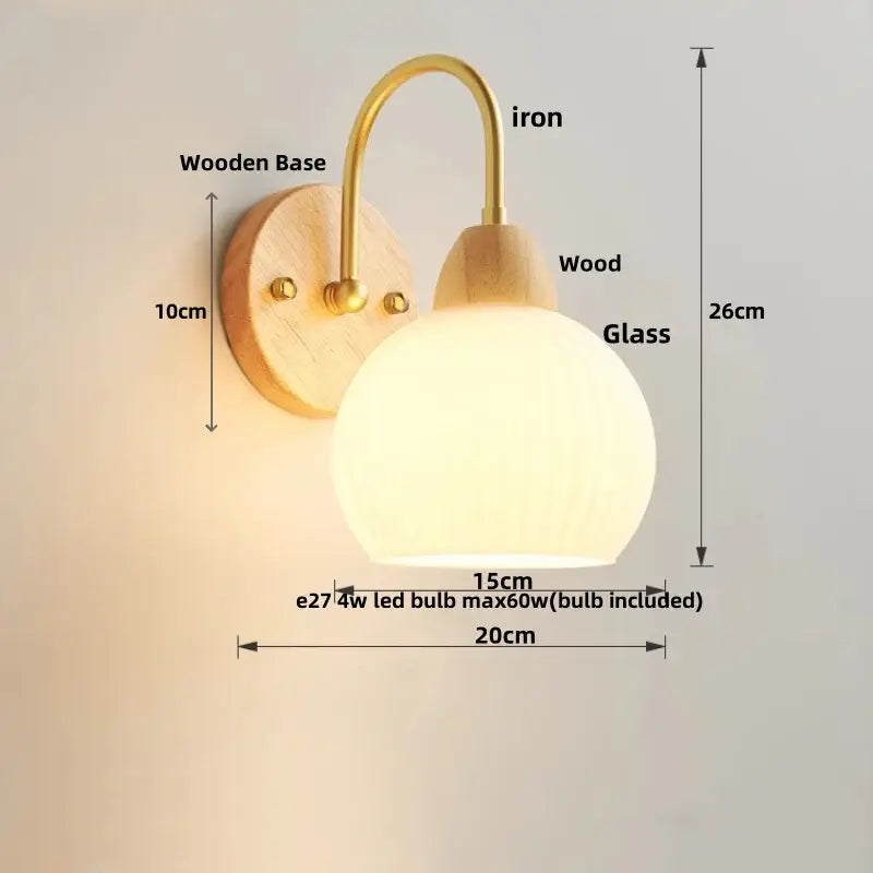 Warm-toned DecorBites LED glass wall sconce with brass iron arm and wooden base for modern stair lighting fixtures