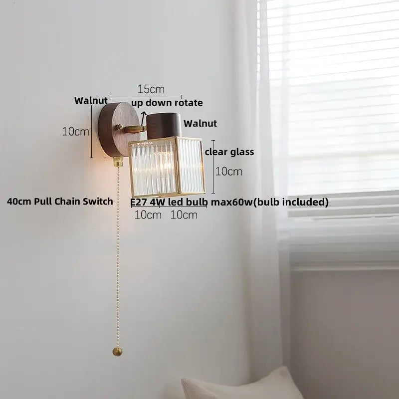 Walnut-finished decorbites led glass and wood wall lamp with clear ribbed glass shade and brass accents in modern nordic design
