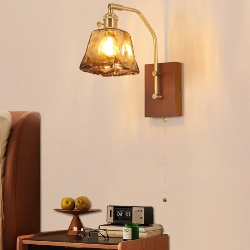 Decorbites led glass and wood wall lamp with brass finish amber textured glass shade and wooden backplate with pull chain switch