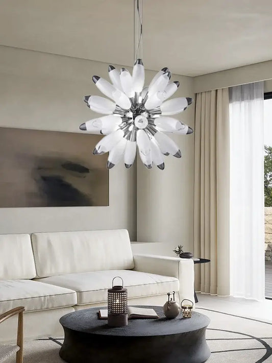 A modern decorbites led globe 2025 chandelier with white frosted glass petals in chrome and gold finish