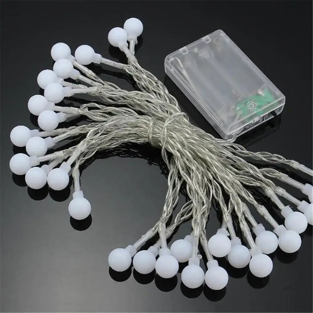 Decorbites led globe string lights featuring white spherical led globe balls on silver wire with clear battery box for decor