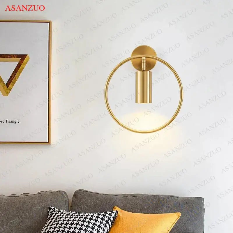Decorbites led gold round wall lamp with gold-toned circular ring and cylindrical led light fixture for bedroom wall sconce