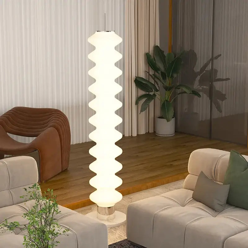 A modern floor lamp with a distinctive zigzag pattern and frosted glass body decorbites led gourd sanding design