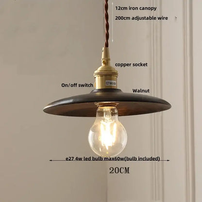 Decorbites led hanging lamp featuring an industrial dark iron canopy brass copper socket on twisted brown wire