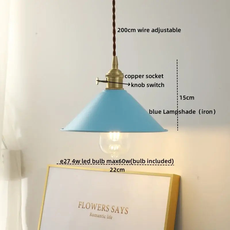 Blue iron lampshade with brass copper socket and knob switch hanging from braided wire in decorbites led hanging lamp