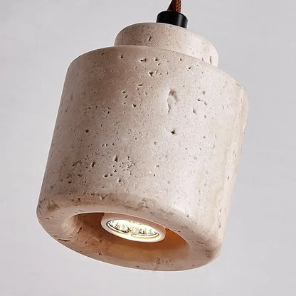 Beige textured concrete pendant light with visible led bulb in decorbites led hanging yellow travertine adjustable fixture