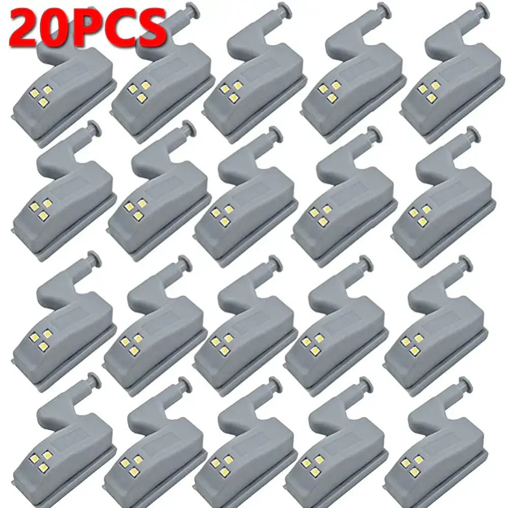 Gray plastic decorbites led hinge sensor lights with four yellow leds for cabinet and wardrobe mounting