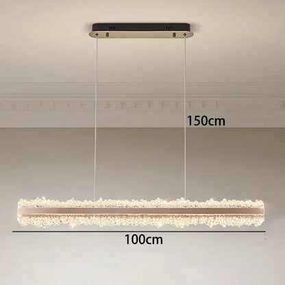 A modern decorbites led indoor rectangular chandelier with black and gold fixture and cascading clear beads for bedroom lighting