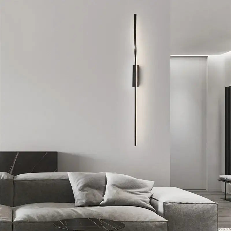 A sleek minimalist black decorbites led indoor wall lamp with copper accents for modern outdoor living room décor