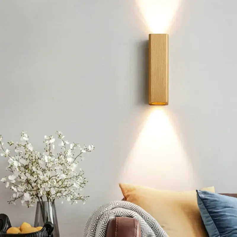 A sleek rectangular decorbites led indoor wall lamp with natural wood finish and warm illumination for corridor lighting