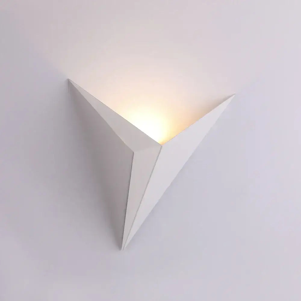 White triangular wall lamp by decorbites led indoor with minimalist design and warm soft light for bedroom and living room