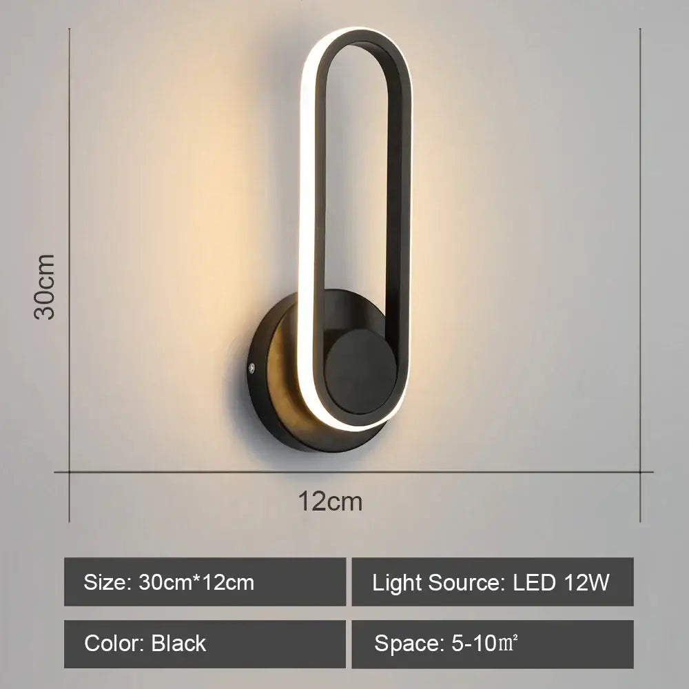 Black modern led indoor wall light decorbites led indoor with sleek curved design and illuminated edge for home lighting