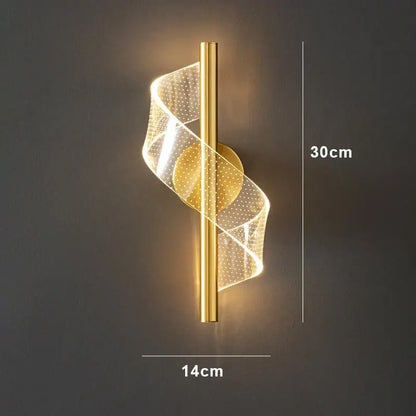 Gold finished modern wall sconce light with spiraling translucent acrylic and embedded LED for indoor decoration