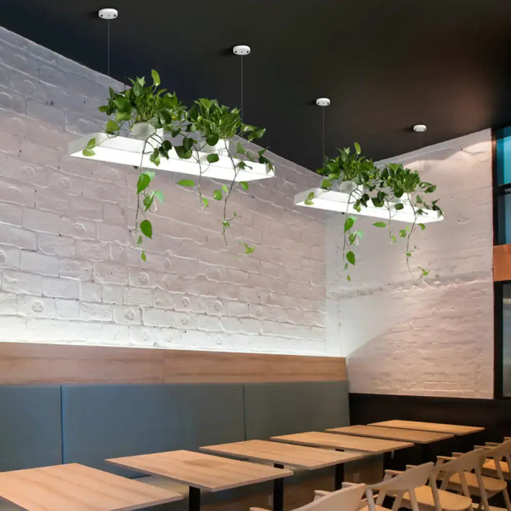 DecorBites™ white acrylic pendant island light fixture with integrated planters featuring green vines and warm white light