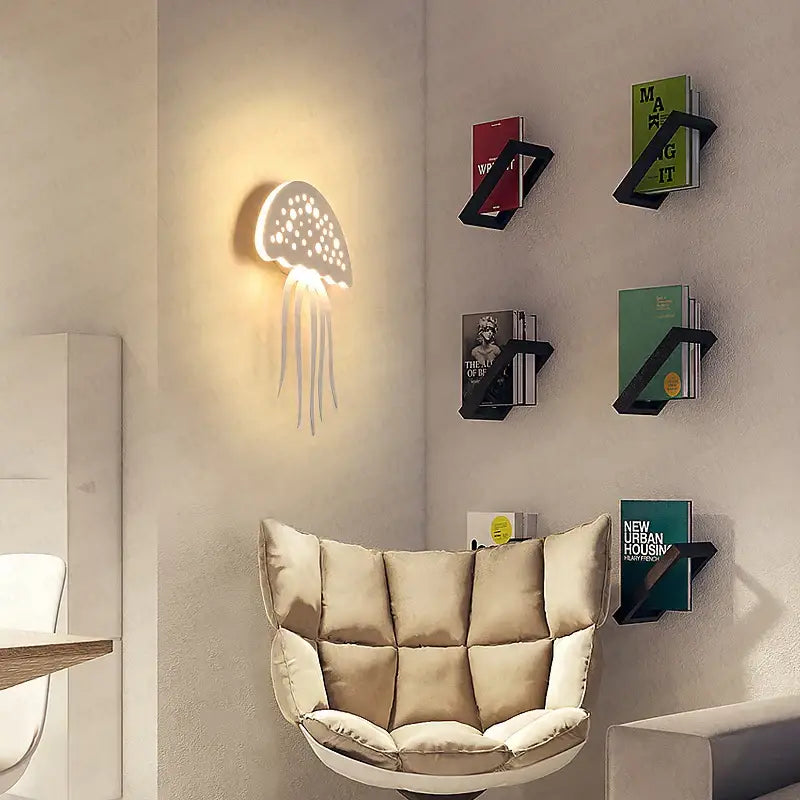 A white illuminated perforated led jellyfish wall lamp with dangling tentacles by decorbites for modern indoor decor
