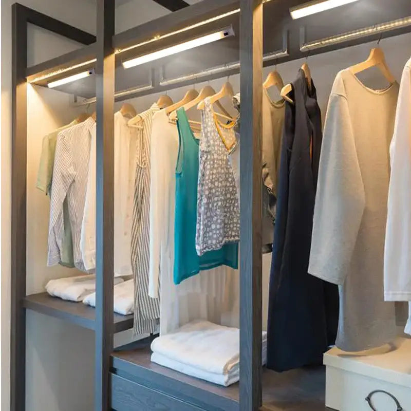 Modern gray wood walk-in closet with decorbites led kitchen cabinet light and integrated hand sweep sensor lighting