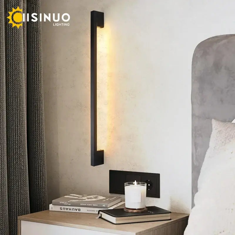 Black rectangular wall lamp with warm glowing light from DecorBites led long for modern minimalist interior lighting