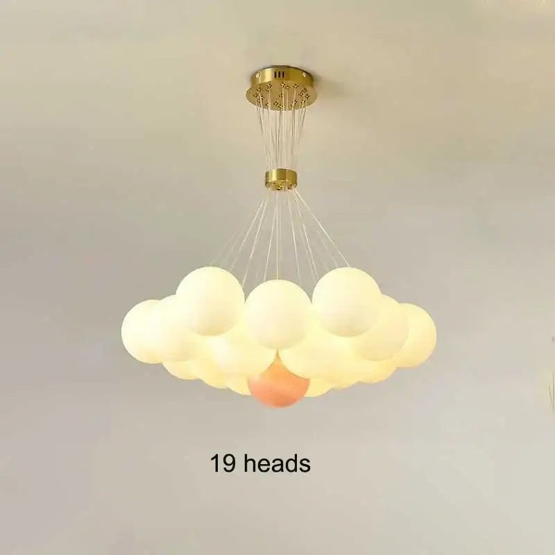A decorbites led lunar cloud-shaped pendant light with 19 frosted glass orbs and gold-toned metal for home decor