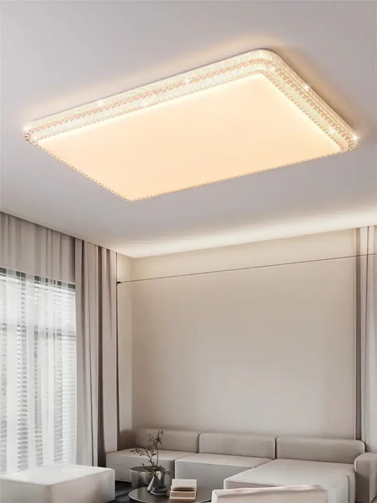 Rectangular ceiling light with warm glow and crystal-encrusted border in DecorBites LED luxury ceiling design