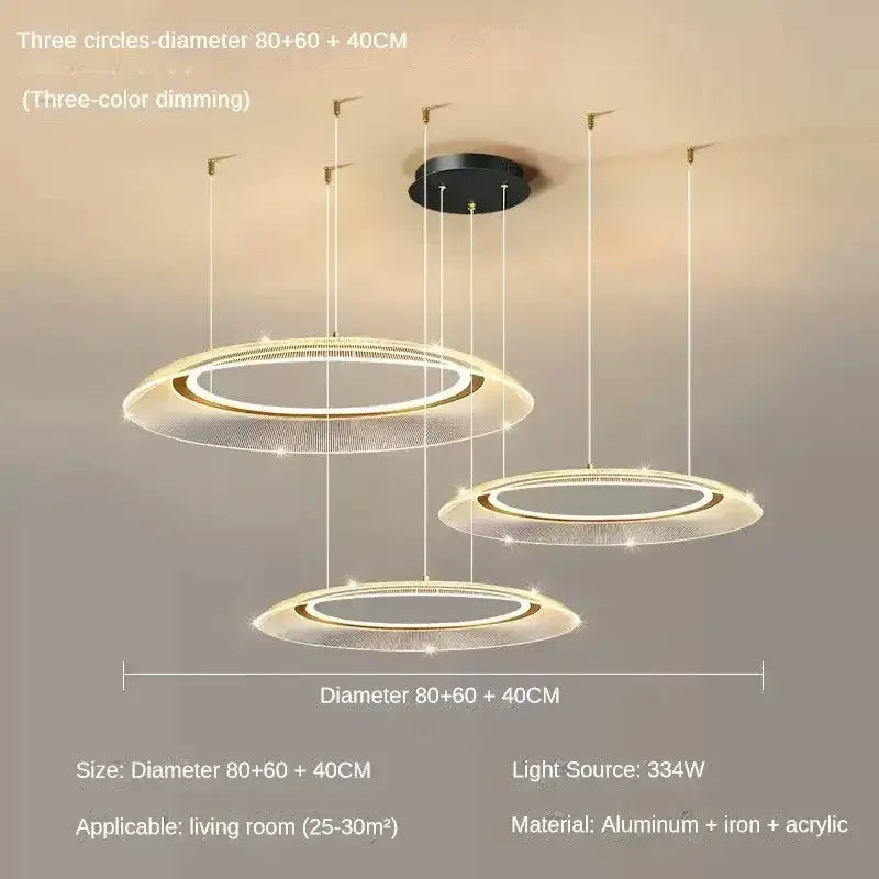 Modern three-tiered decorbites led luxury ring chandelier with translucent acrylic rings and gold-toned accents for living rooms