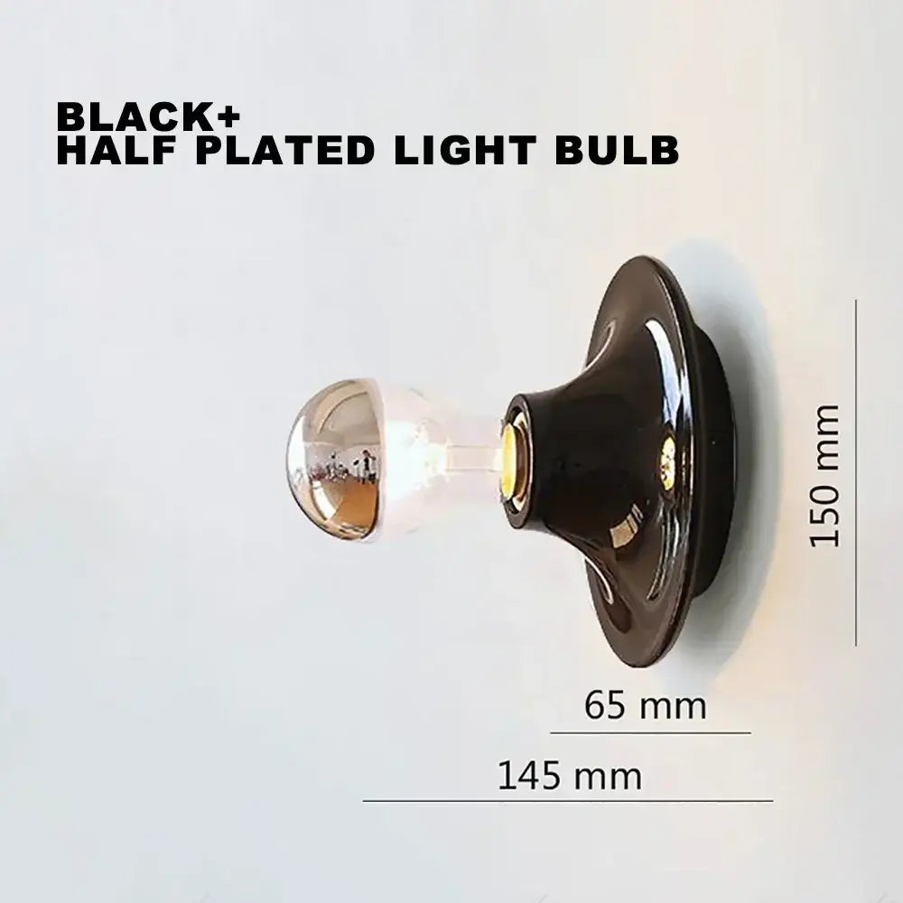 Black half-plated decorbites led macaron wall lamp with reflective glass globe and metallic base for bedroom lighting