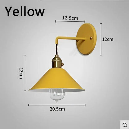 Yellow conical wall light with brass accents and visible bulb by DecorBites led macarons colorful for home improvement