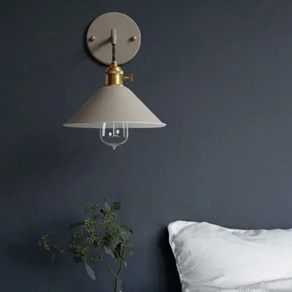 Decorbites led macarons colorful wall light with matte off-white conical shade brass accents and clear glass bulb wall light