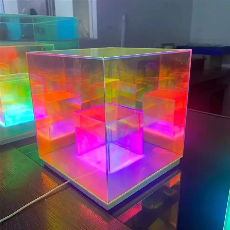 Translucent cube-shaped decorbites led magic acrylic table lamp with vibrant rainbow illumination and modern design