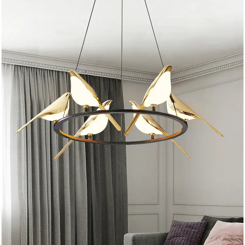 Gold-toned decorbites led magpie bird pendant light chandelier with frosted glass and black circular frame for modern decor